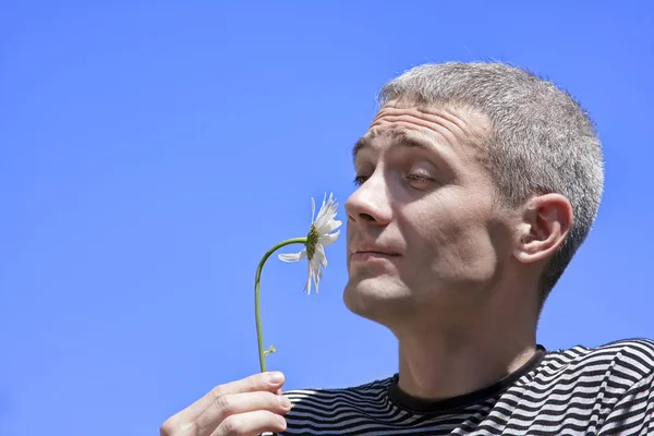 The man and a flower — Stock Photo, Image