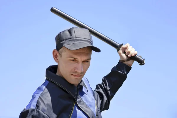 The security guard with a bludgeon Stock Picture