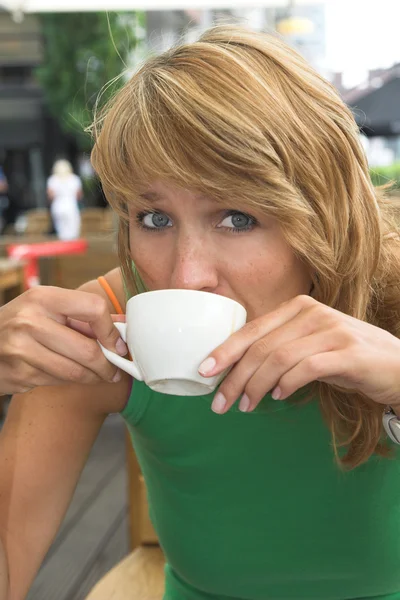 Taking a sip — Stock Photo, Image