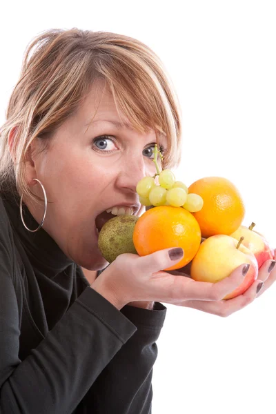 Pretty blond girl with fruits — Stock Photo, Image