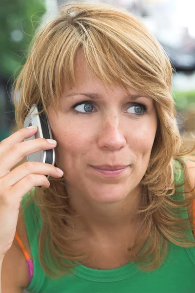Listening to the phone — Stock Photo, Image