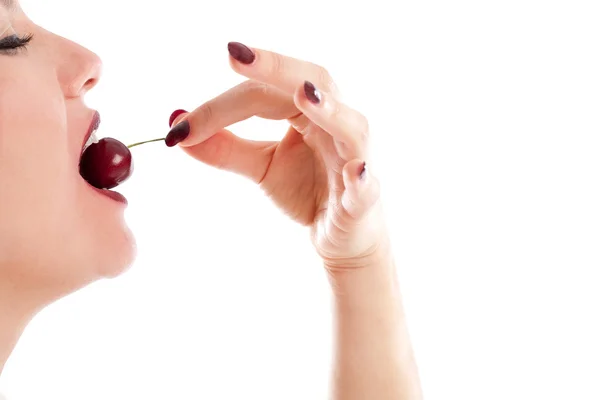 Eating a cherry — Stock Photo, Image