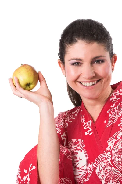 Sostiene una manzana — Foto de Stock