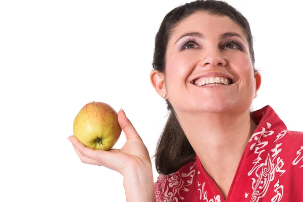 Morena bonita segurando uma maçã — Fotografia de Stock