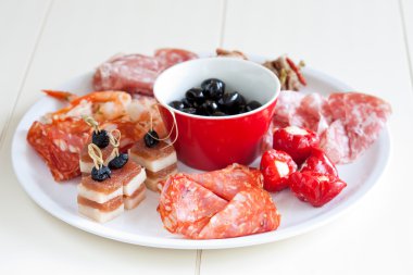 Delicious plate of antipasti clipart