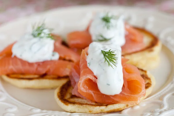 Pancake with salmon and sourcream — Stock Photo, Image