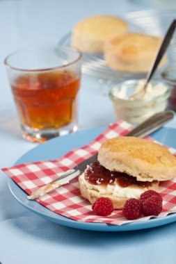 Scones with cream and jam clipart