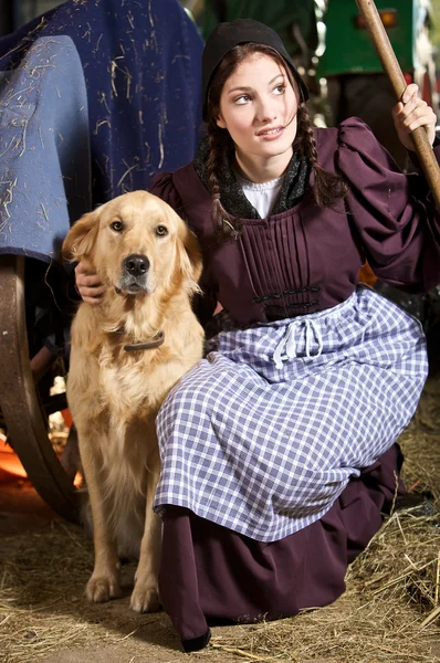 Farming girl and her dog — Stock Photo, Image