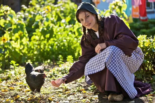 Feeding the chickens — Stock Photo, Image