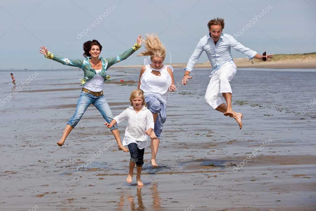 Jumping on the beach Stock Photo by ©Fotosmurf 3631992