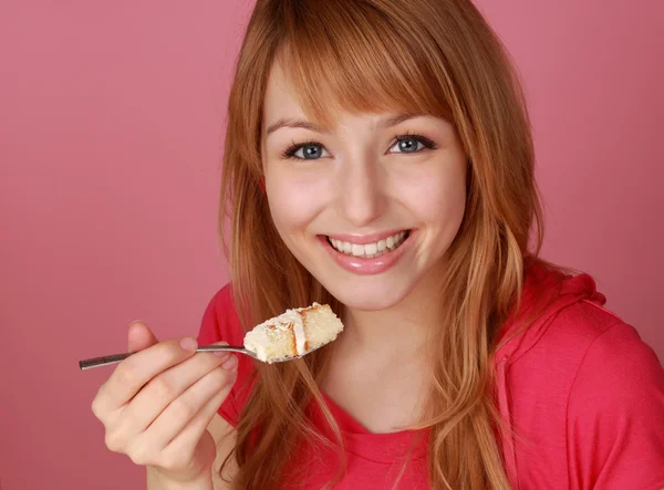 Girl eating cake — Stock Photo, Image