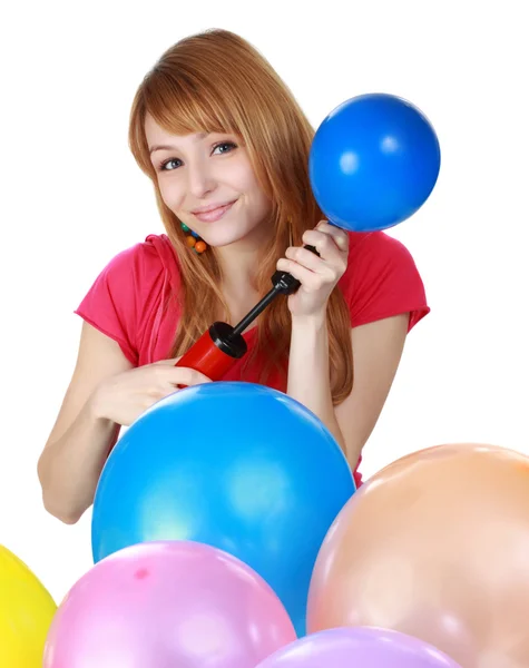 Girl blowing air balloon — Stock Photo, Image