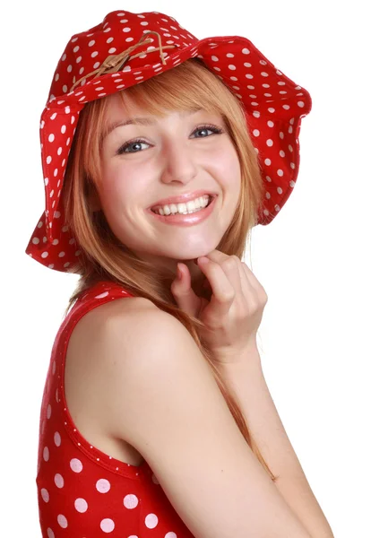 Kırmızı elbise ve şapka ile şirin kız — Stok fotoğraf