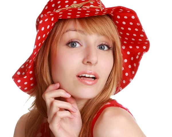 Söt flicka med röd klänning och hatt — Stockfoto