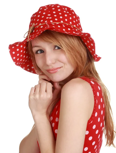 Χαριτωμένο κορίτσι με κόκκινο φόρεμα και καπέλο — Φωτογραφία Αρχείου