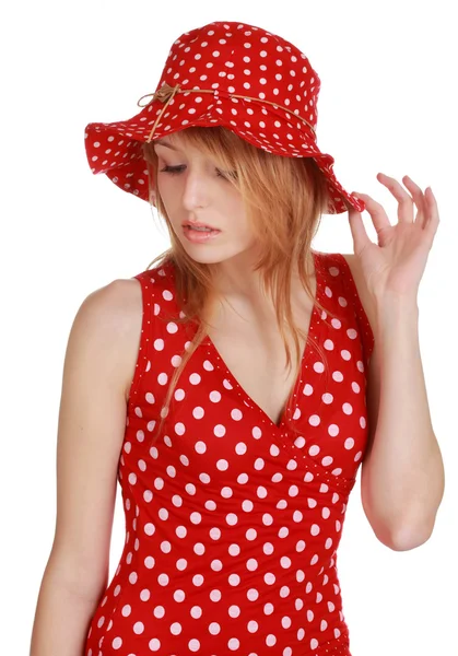 Kırmızı elbise ve şapka ile şirin kız — Stok fotoğraf