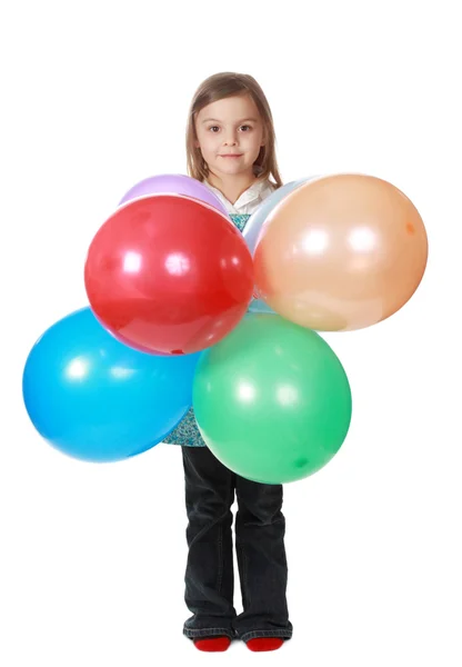 Κορίτσι που κρατάει ένα μάτσο μπαλόνια — Φωτογραφία Αρχείου