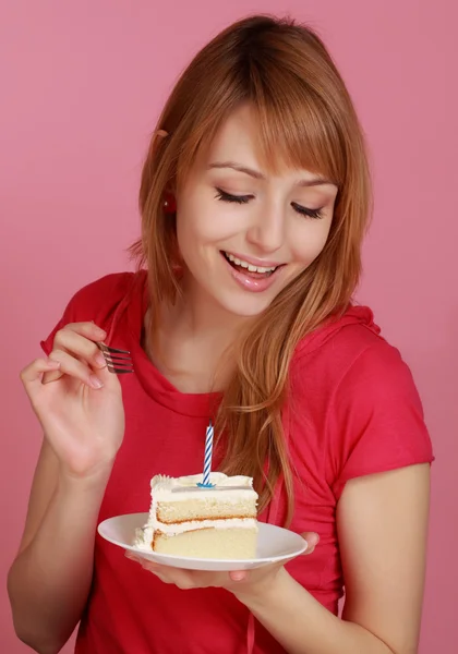 Girl looking at cake Stock Image