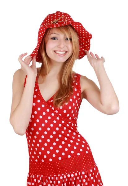可爱的女孩与红色的衣服和帽子 免版税图库照片