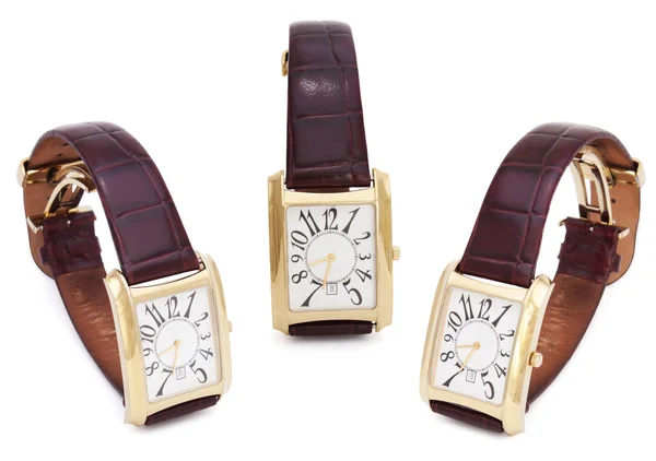Três relógios de pulso dourados isolados — Fotografia de Stock