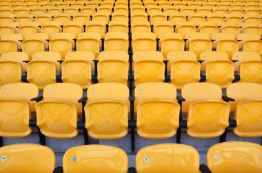 Vertical row yellow seat in stadium clipart