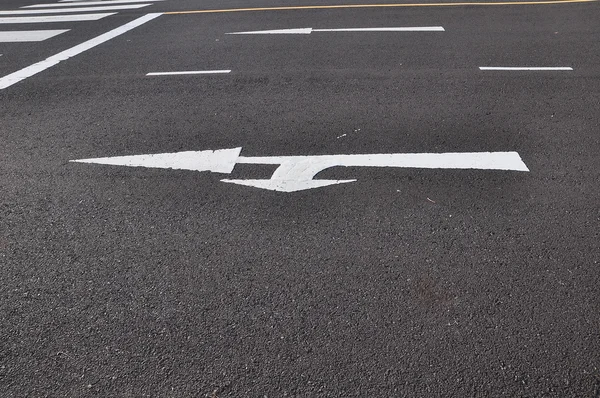 Two direct arrow on the asphalt road — Stock Photo, Image