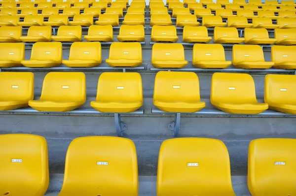 Yellow seat in arena — Stock Photo, Image