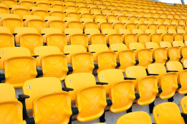 Yellow chair in stadium clipart