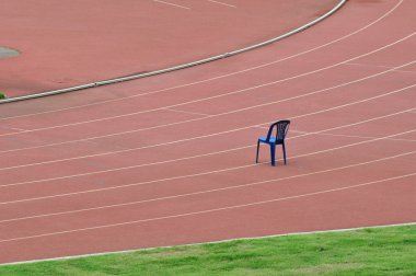 Running lane with empty chair clipart
