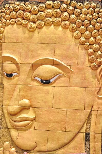 Goud kleur Boeddha hoofd — Stockfoto