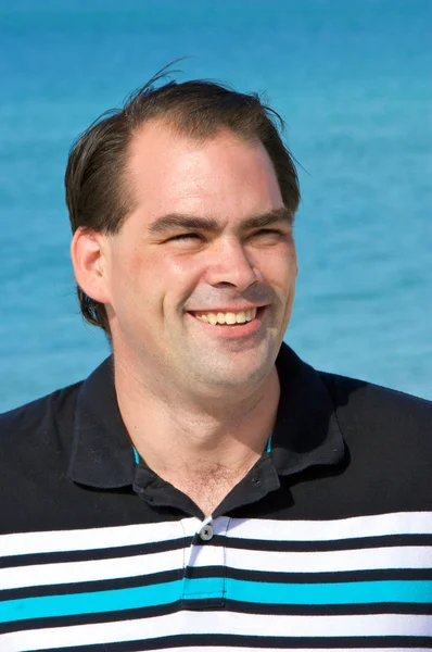 Average dark haired man smiling — Stock Photo, Image