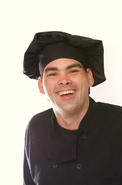 Happy laughing chef in black