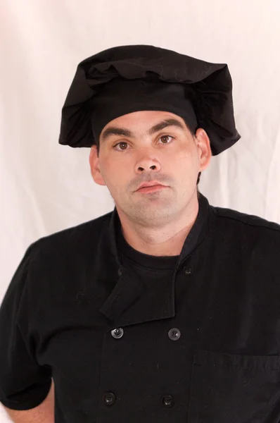 Stock image Male chef in black