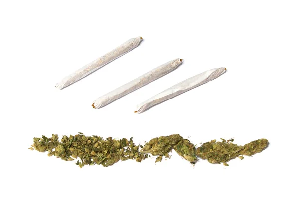 Joints and row of marijuana — Stock Photo, Image