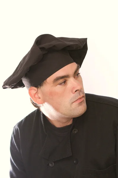 Stock image Portrait of male chef in black