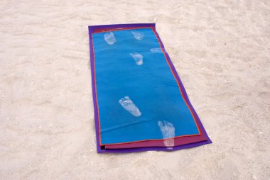 Yoga mat on beach clipart