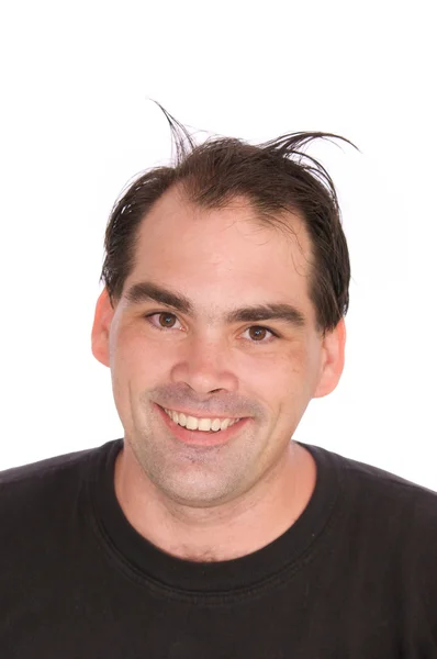 En smilende mann med rar frisyre – stockfoto