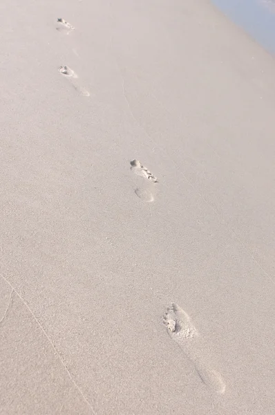 Fußabdrücke im Sand — Stockfoto