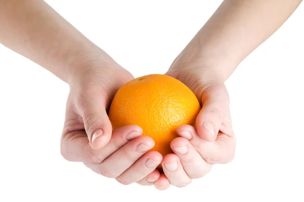 Big orange i händer — Stockfoto