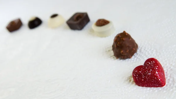 Different candies on white — Stock Photo, Image