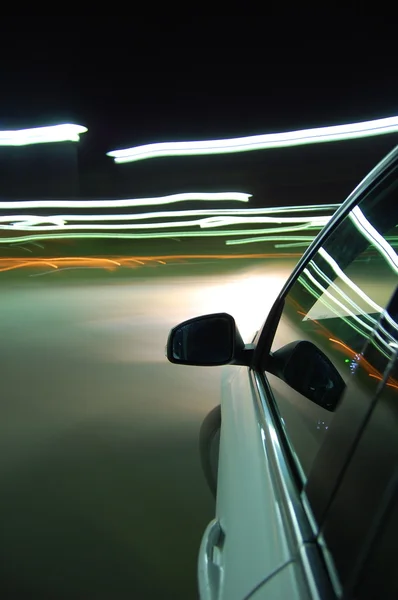 Conducción nocturna con coche en movimiento — Foto de Stock