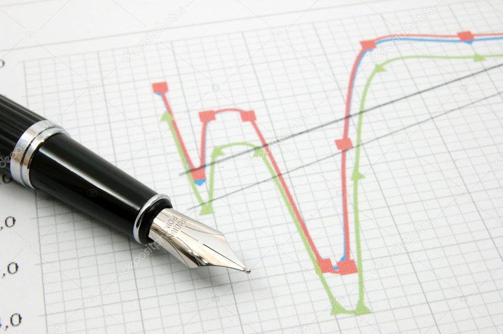 Fountain pen on business chart