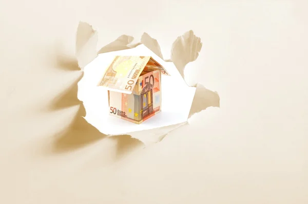 Euro money house and paper hole — Stock Photo, Image