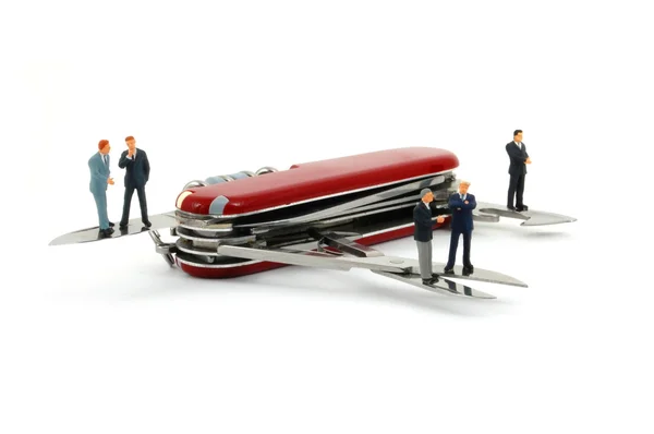 Business on penknife — Stock Photo, Image