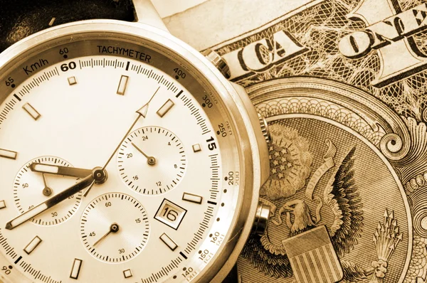 Parayı ve saati — Stok fotoğraf
