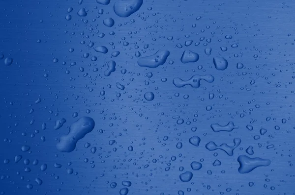 Vattendroppar på metallytan — Stockfoto