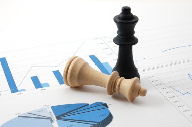 Chess man over business chart clipart