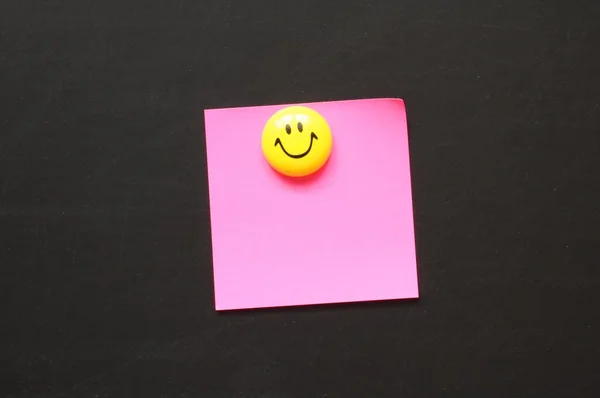 Smiley and paper with copyspace — Stock Photo, Image