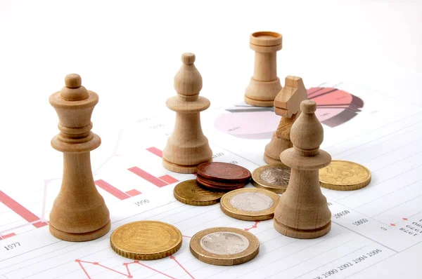 stock image Chess man over business chart