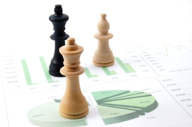 Chess man over business chart clipart